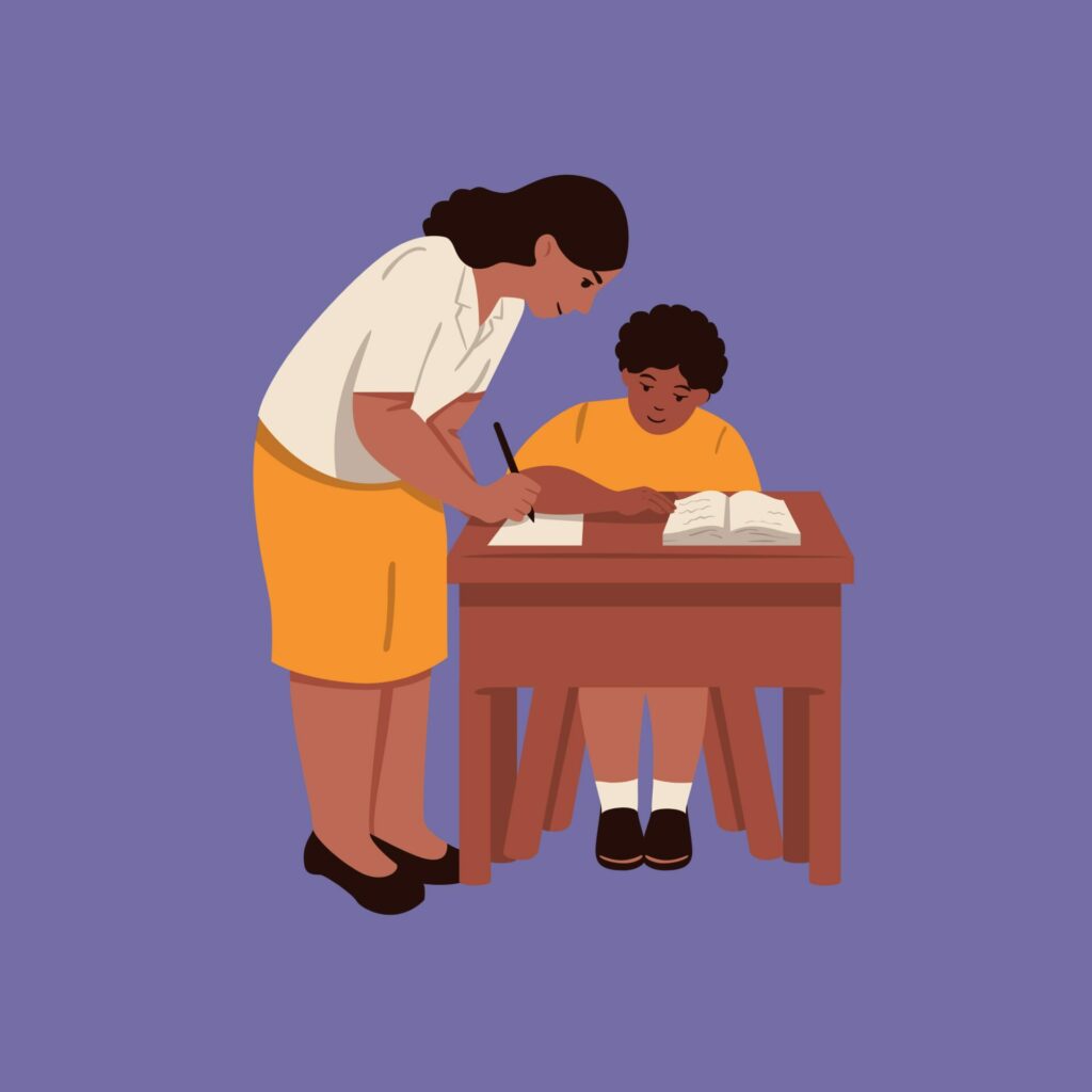 A teacher helping in the classroom